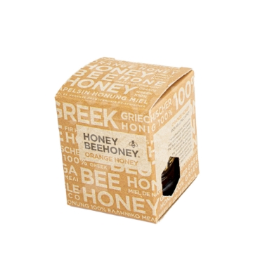 Bright and Refreshing Orange Blossom Honey Citrusy Orange Blossom Honey jar displayed with fresh orange slices.