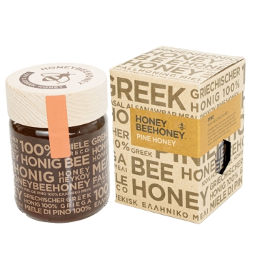 Premium Greek Raw Pine Honey - Rich Dark Amber Hue Jar of Premium Greek Raw Pine Honey with Dark Amber Hue
