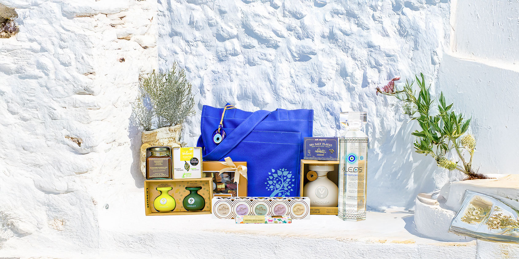 Griechischer Luxus-Geschenkkorb mit handwerklich hergestelltem Olivenöl, Honig und Gourmet-Leckereien in einer hochwertigen Präsentationsbox