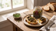 Escargot De Crete Snail Fillets in Cretan Olive Oil - 90g Jar on a clean ecommerce background